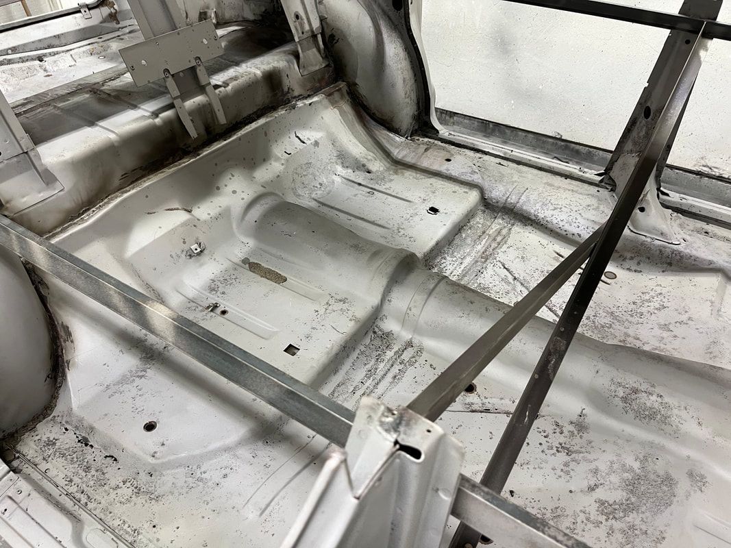 The inside of a car that is being restored.