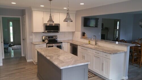 Basement Remodel State College — Kitchen with White Granite Tile in State College, PA