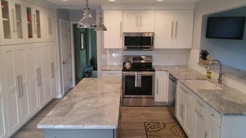 Basement Remodel State College — Kitchen with White Granite Tile and Drawer in State College, PA