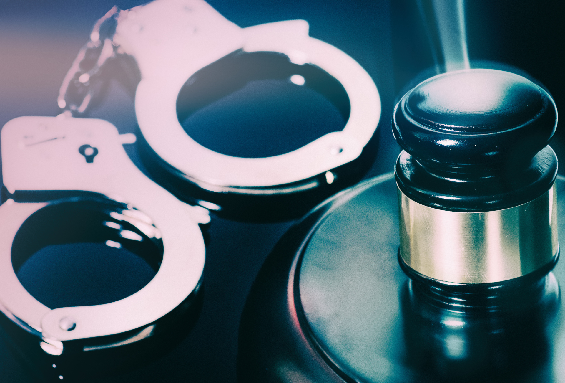 A person is putting a stamp on a piece of paper.