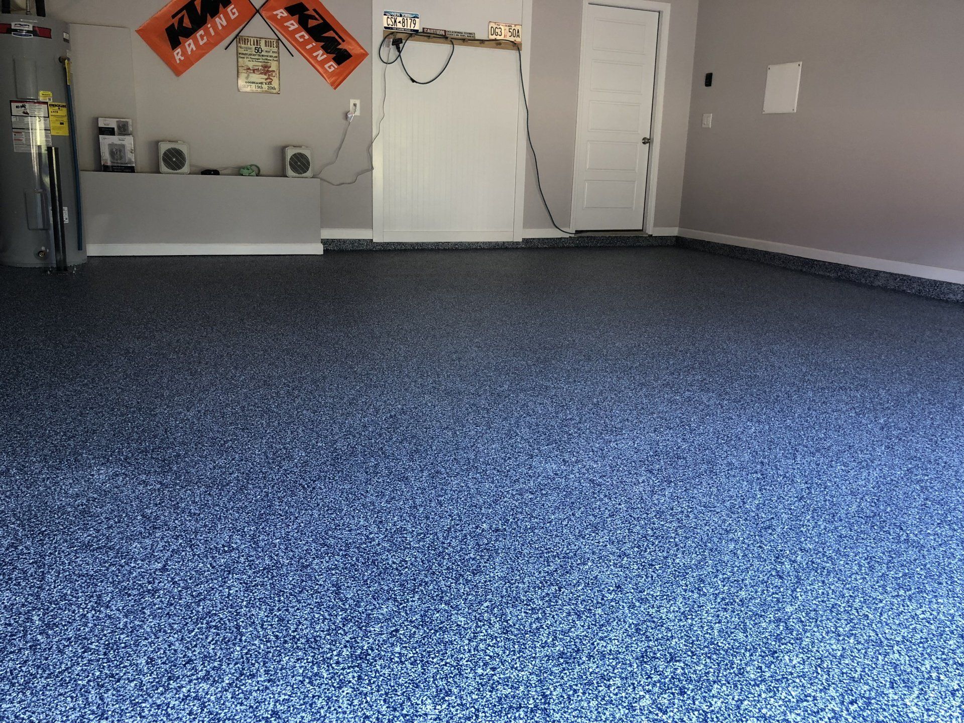 Floor With Blue Flakes Flooring — Appleton, WI — Renew Garage Floor Coatings