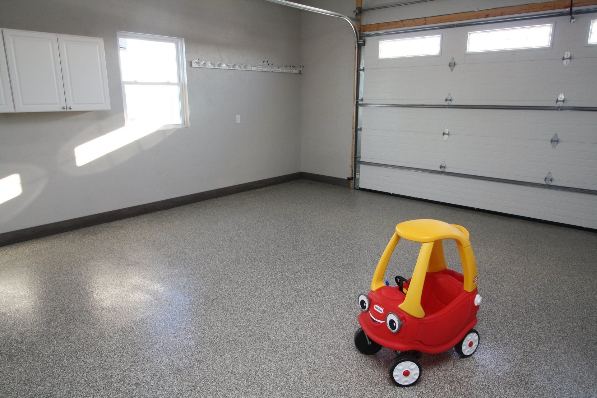 Garage With Toy Car — Appleton, WI— Renew Garage Floor Coatings