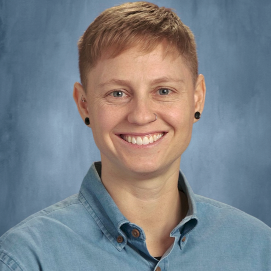 Tandy Lewis, Deaf Non-Binary LICSW, offers person-centered therapy for LGBTQIA+ individuals and identity exploration.