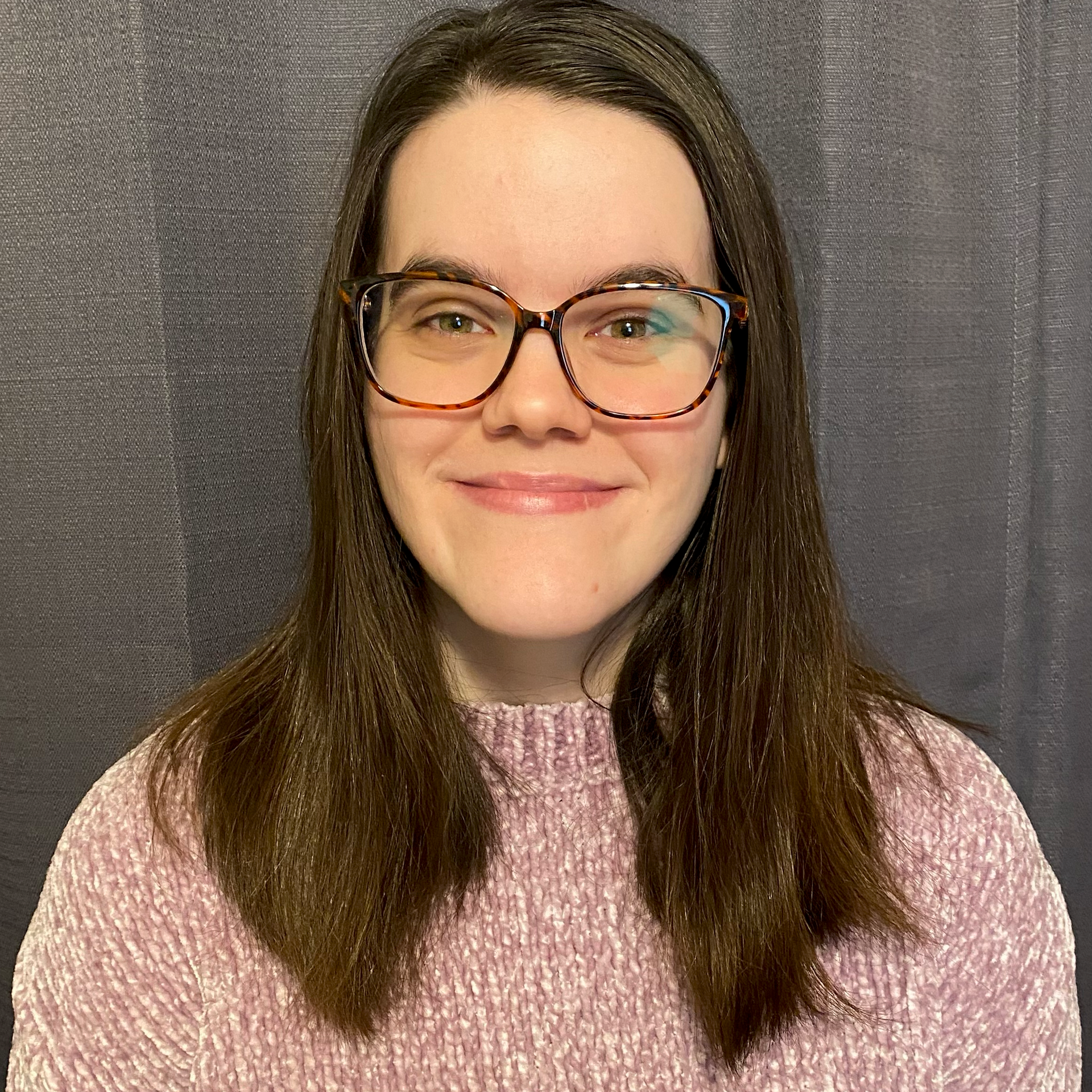 Katie McMahon, Deaf social worker, specializes in therapy for the Deaf community, focusing on mental health and trauma.