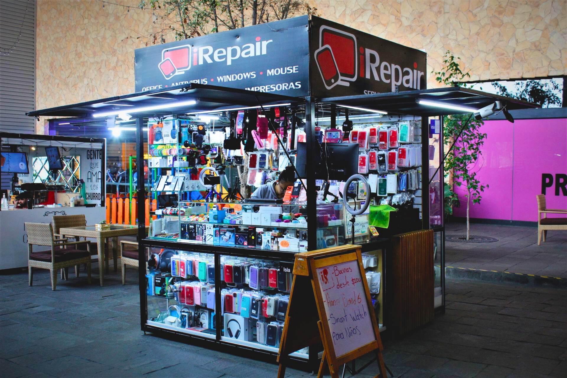 Un puesto de reparación con un cartel que dice reparar