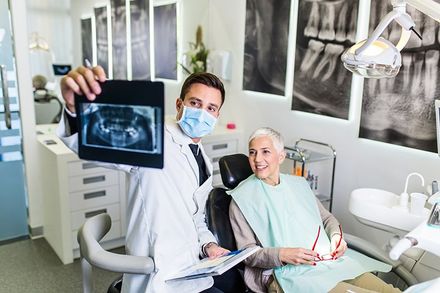 DMD — Dentist Checking Teeth X-Ray in Hillsborough, NJ