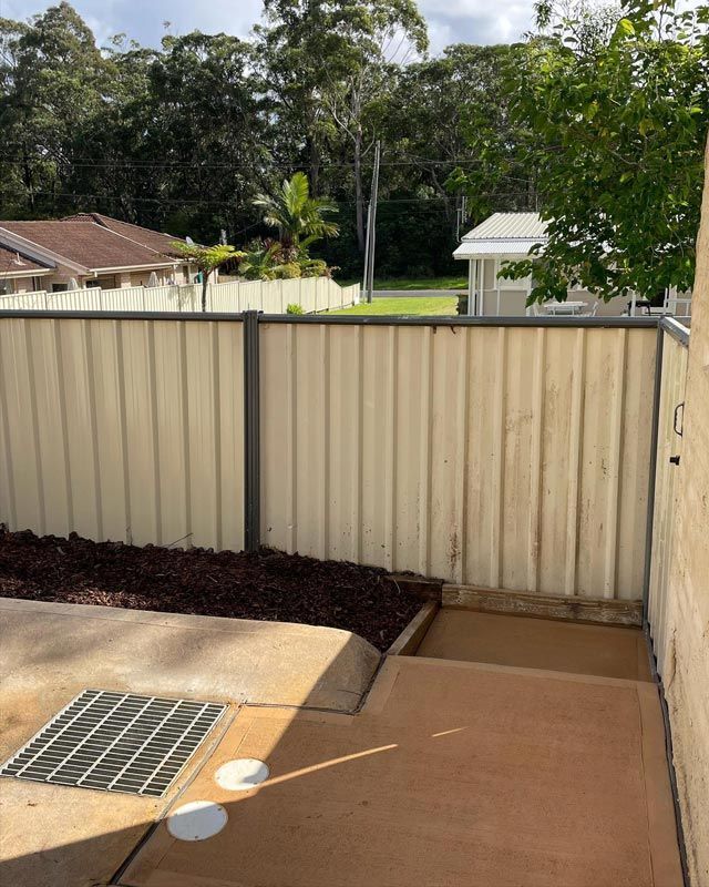 Outdoor Drain System On A Footpath — Bridge Plumbing & Trades in Nowra, NSW