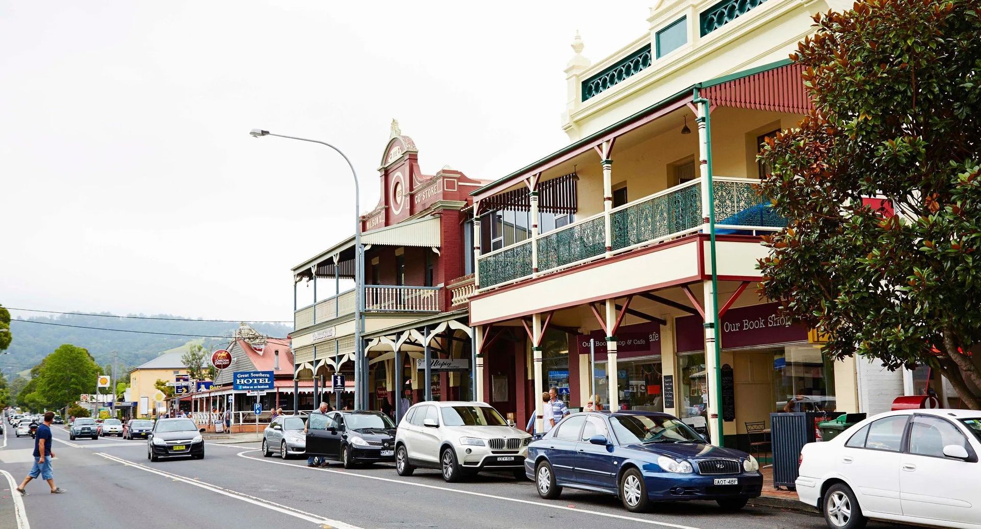 Castle Style Bridge Post With A Four Wheeler Coming Through It — Bridge Plumbing & Trades in Berry, NSW