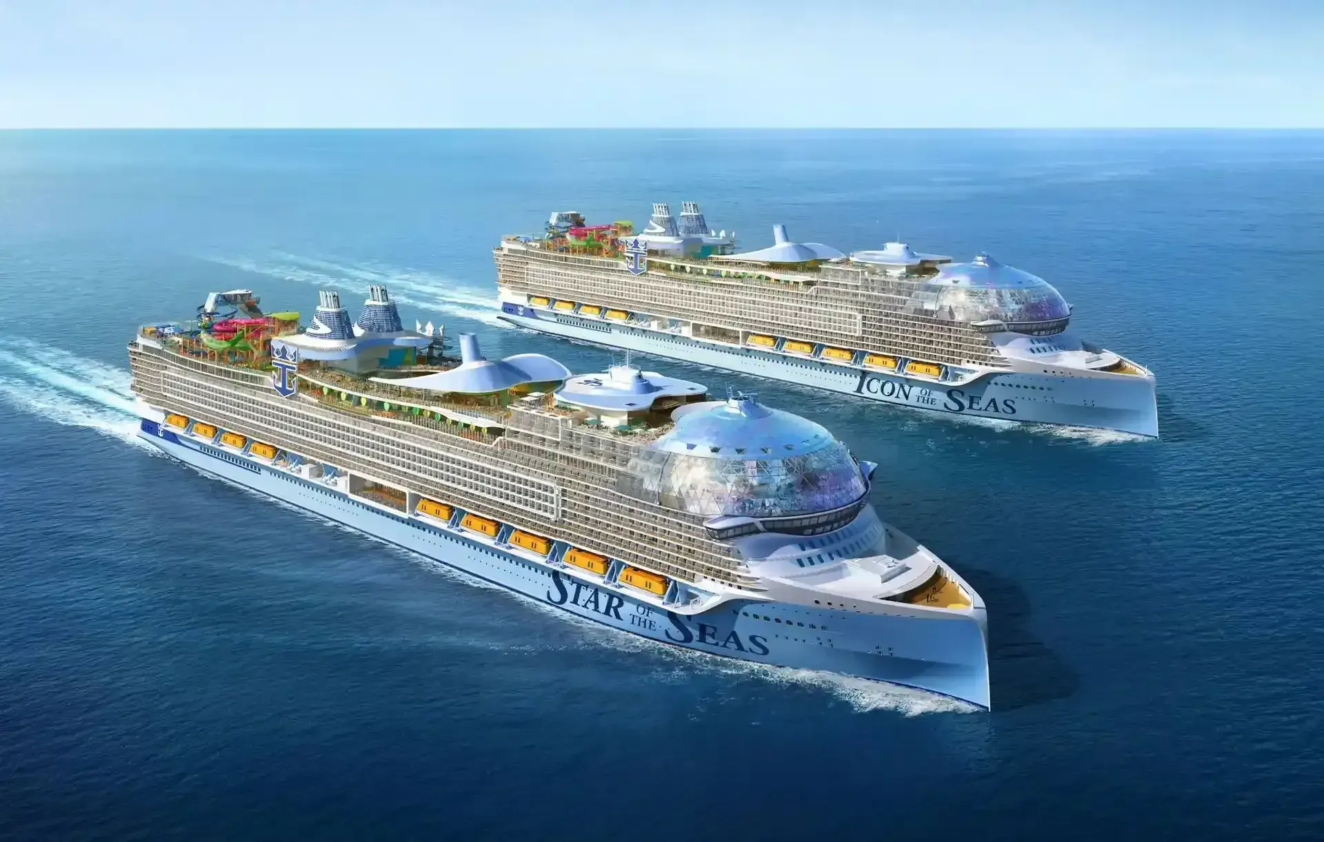 Two cruise ships are floating in the ocean.