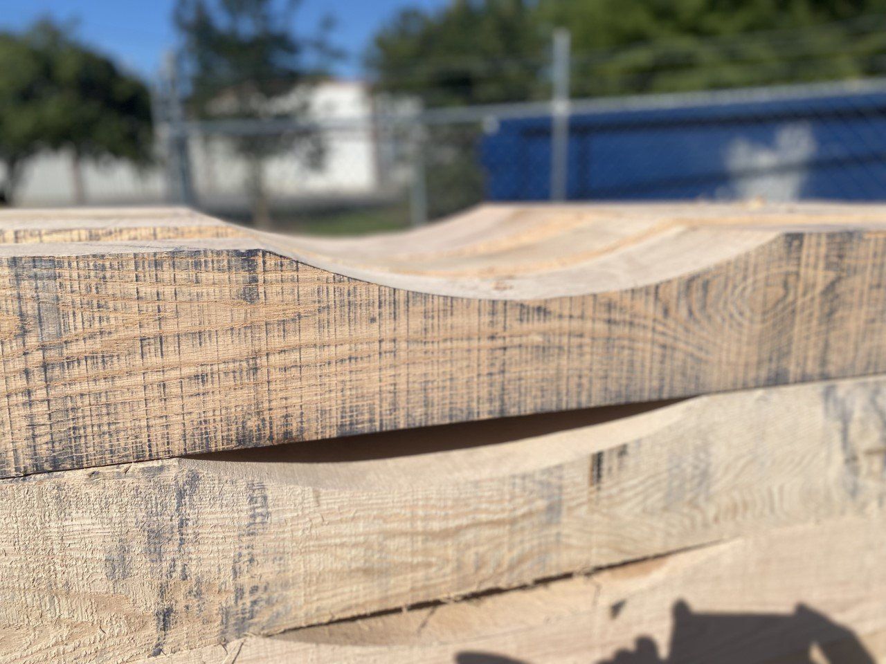 Two pieces of wood are stacked on top of each other.