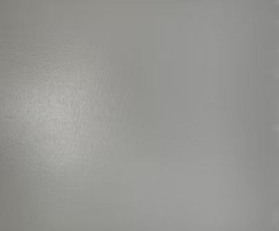 Gray, reflective surface with subtle texture.