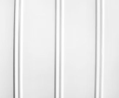 White vertical paneling with raised ridges.