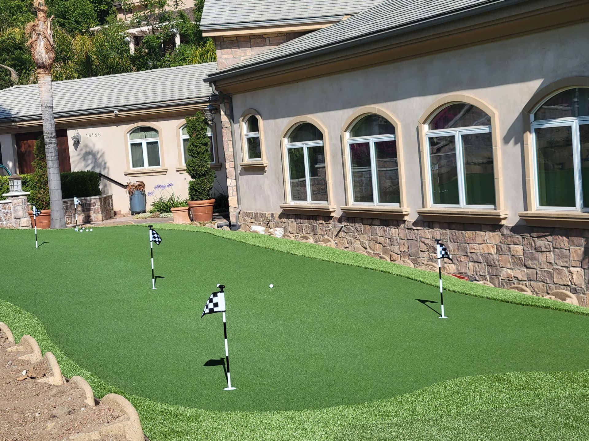front yard artificial putting green