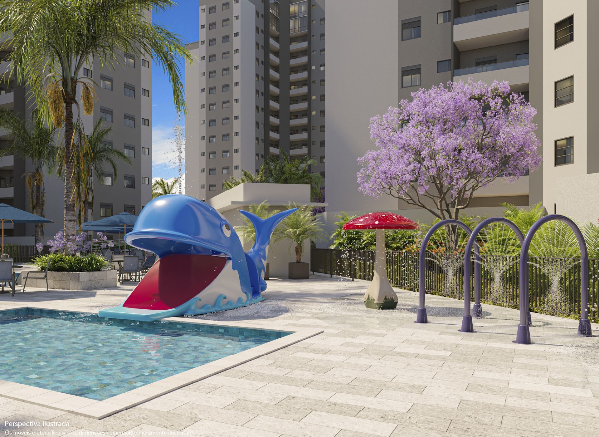 Área de piscina com toboágua em formato de baleia, fonte de cogumelo e irrigadores; localizada em frente a prédios de apartamentos.