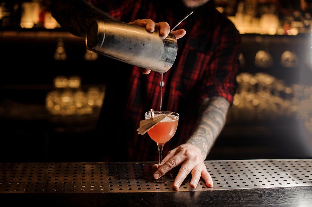 Barman Blending Alcoholic Drink — O'Fallon, MO — Clayton's