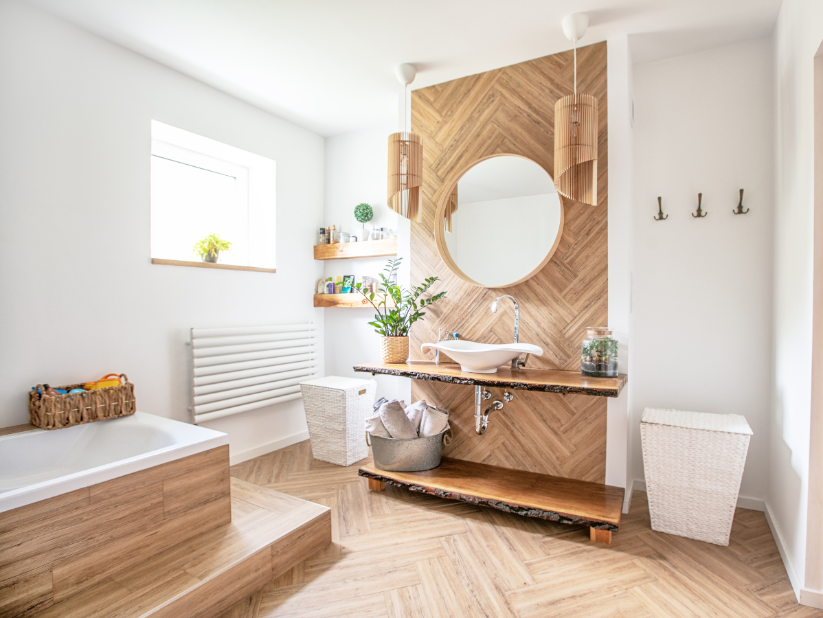 Wooden-themed bathroom with bathtub, sink, and decorative wall. Neutral tones create a spa-like feel.