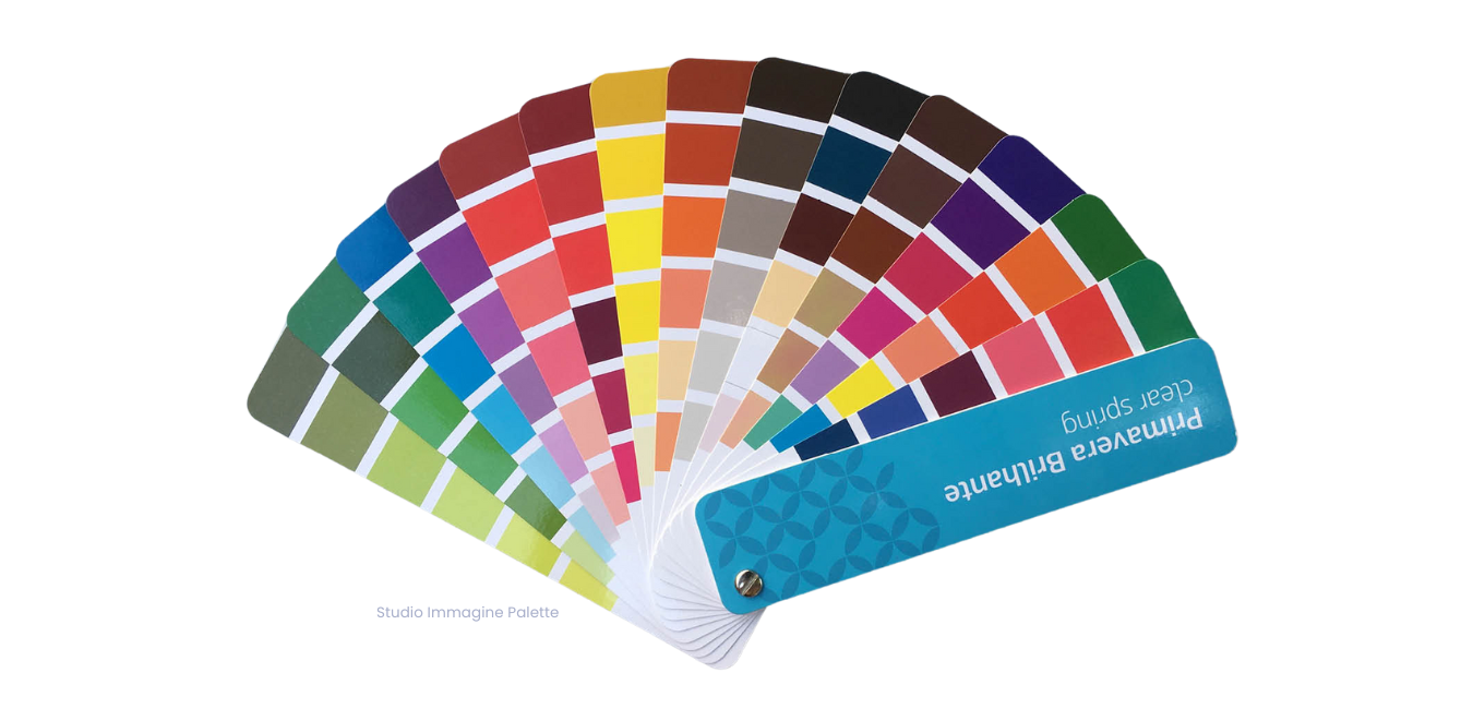 A fan with a bunch of different colors on it