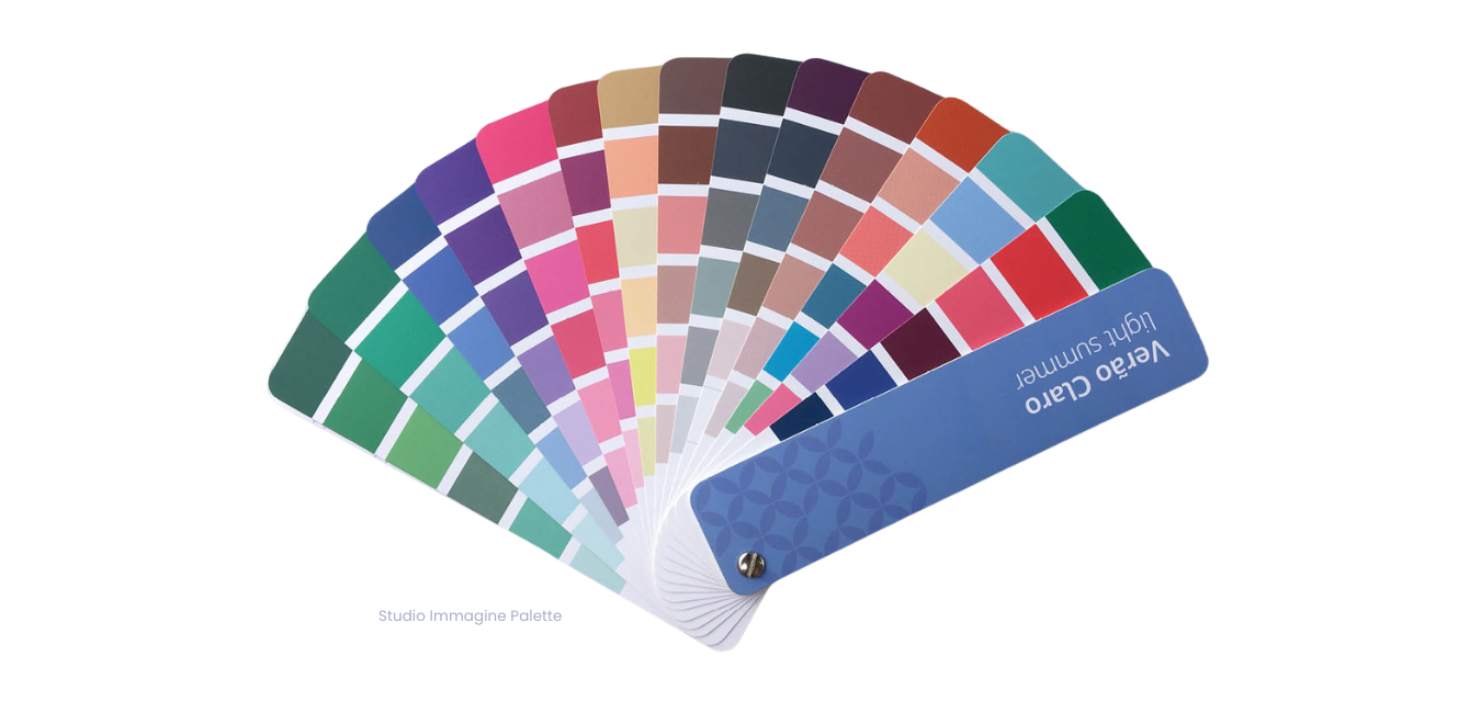 A fan with a bunch of different colors on it