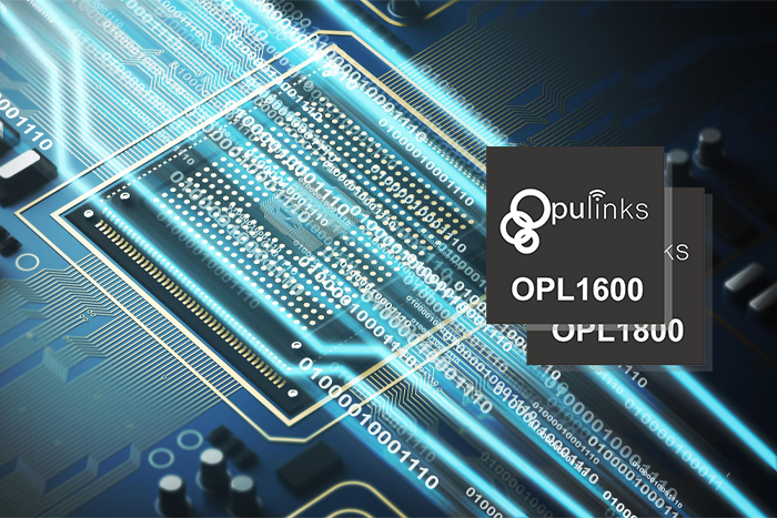 Close-up of a circuit board with binary code and two black labels: Oplinks OPL1600 and OPL1800.