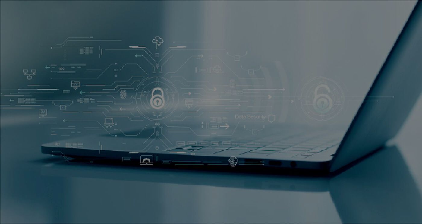 Laptop with digital security overlay, featuring padlocks and circuit board lines.