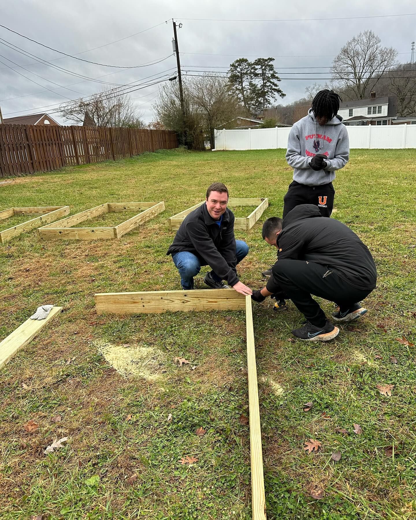 James Becknell helping with lumber.