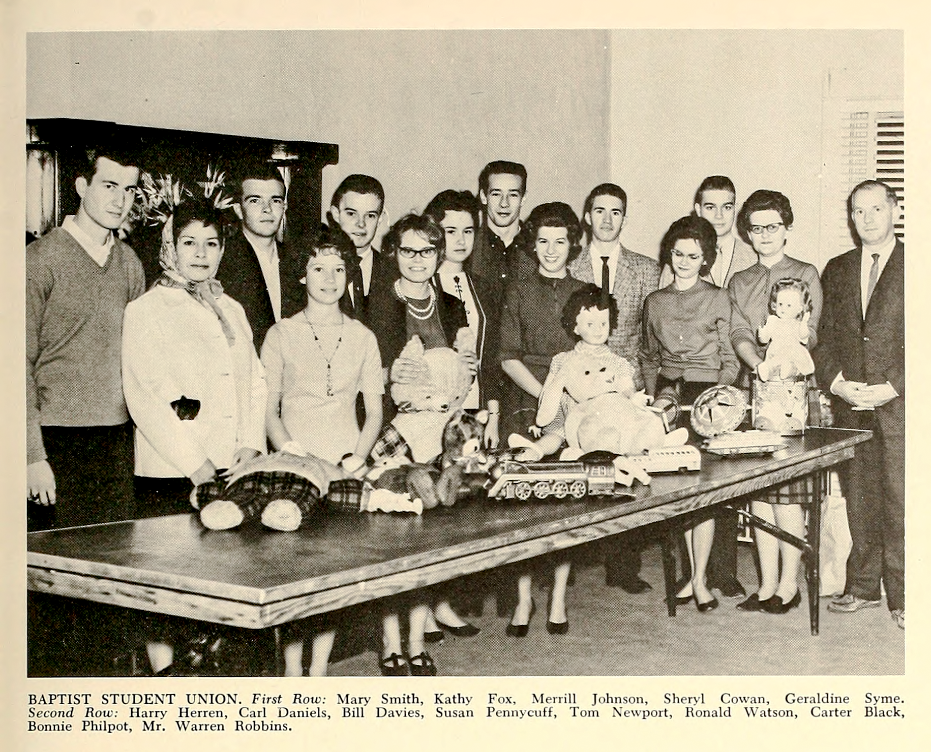 1964 yearbook photo of the Baptist Student Union, featuring Bill, Merrill, and Mr. Warren Robbins.
