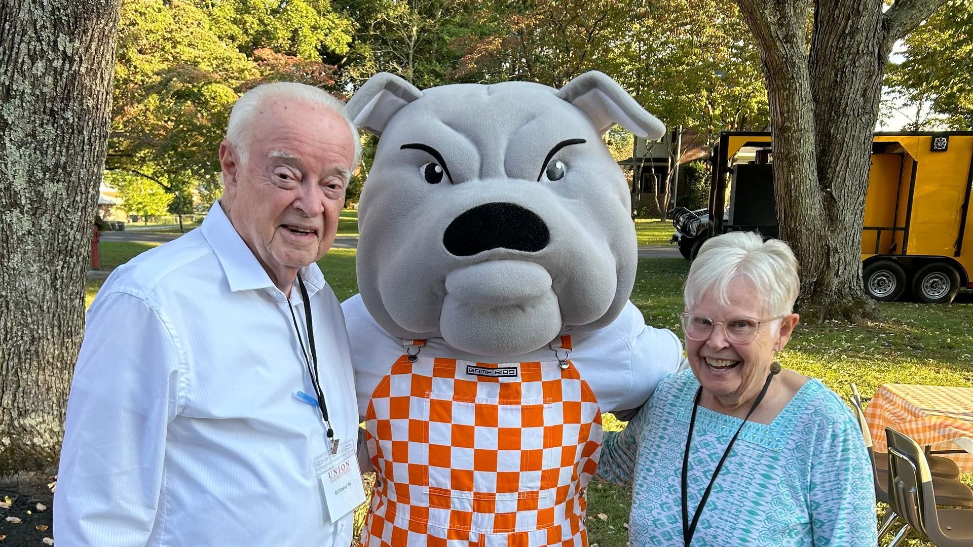 Bill and Merrill Davies with the Union Mascot, Mack the Bulldog.