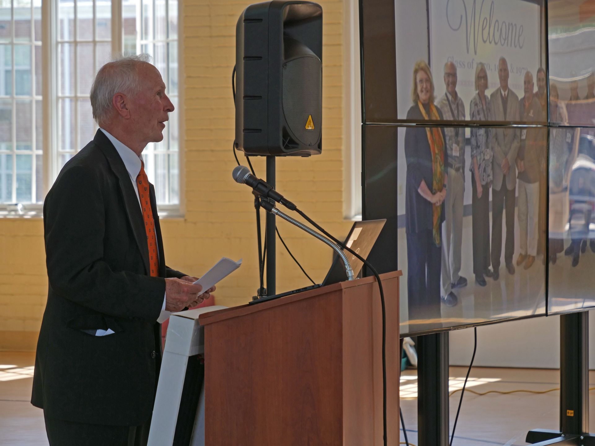 Dr. Inkster speaks at the podium.