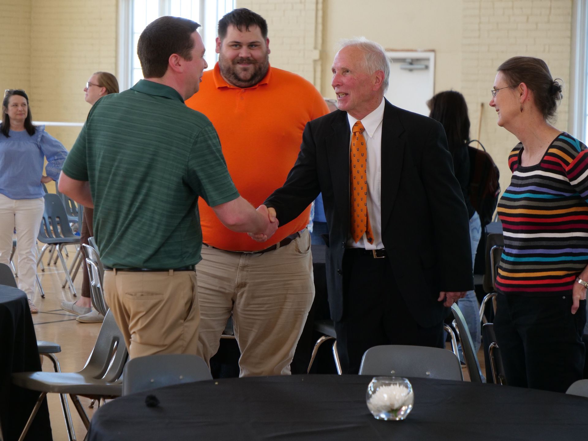 Dr. Inkster shaking hands with James Becknell.