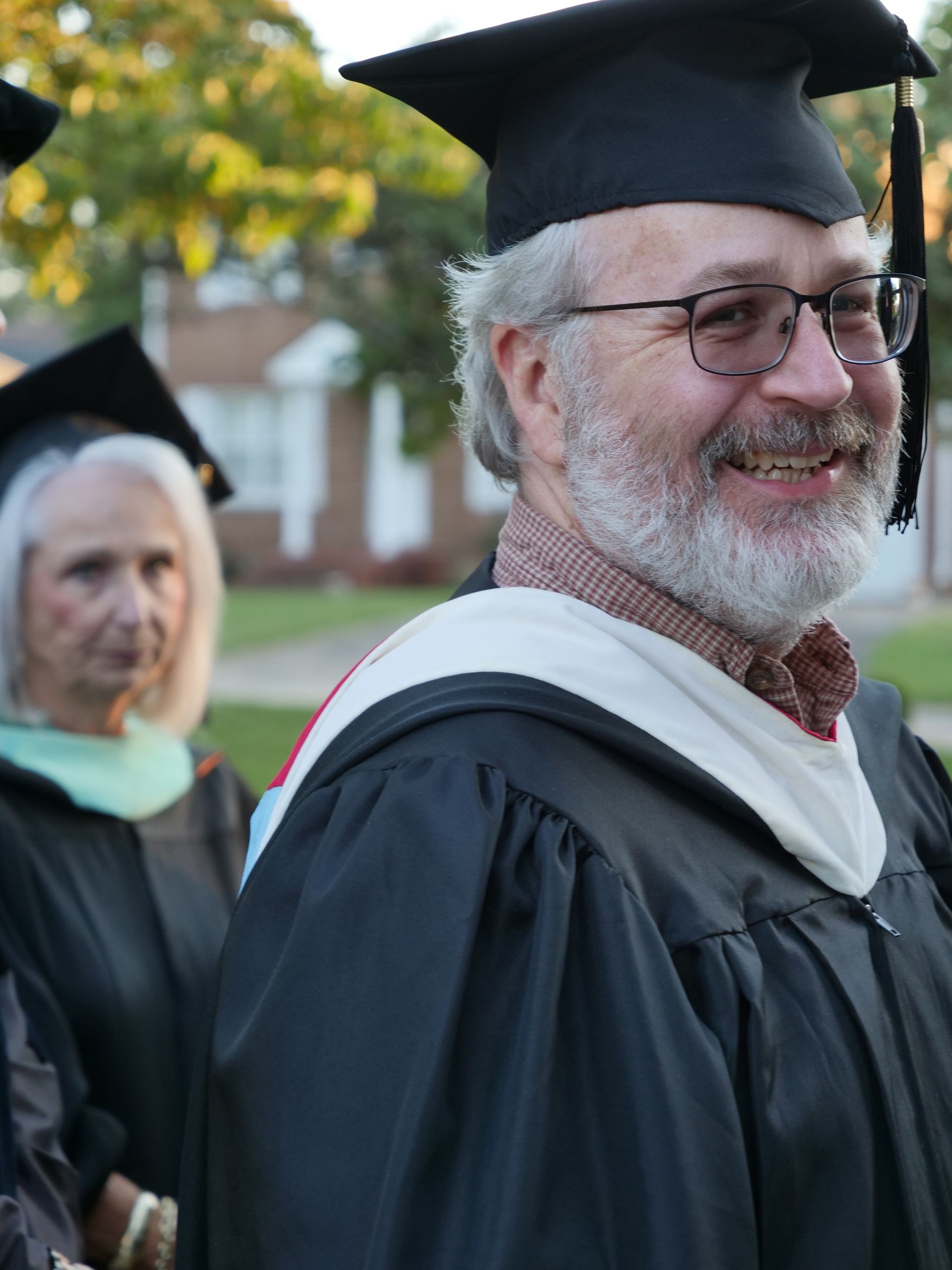 Bruce Cory in academic regalia.