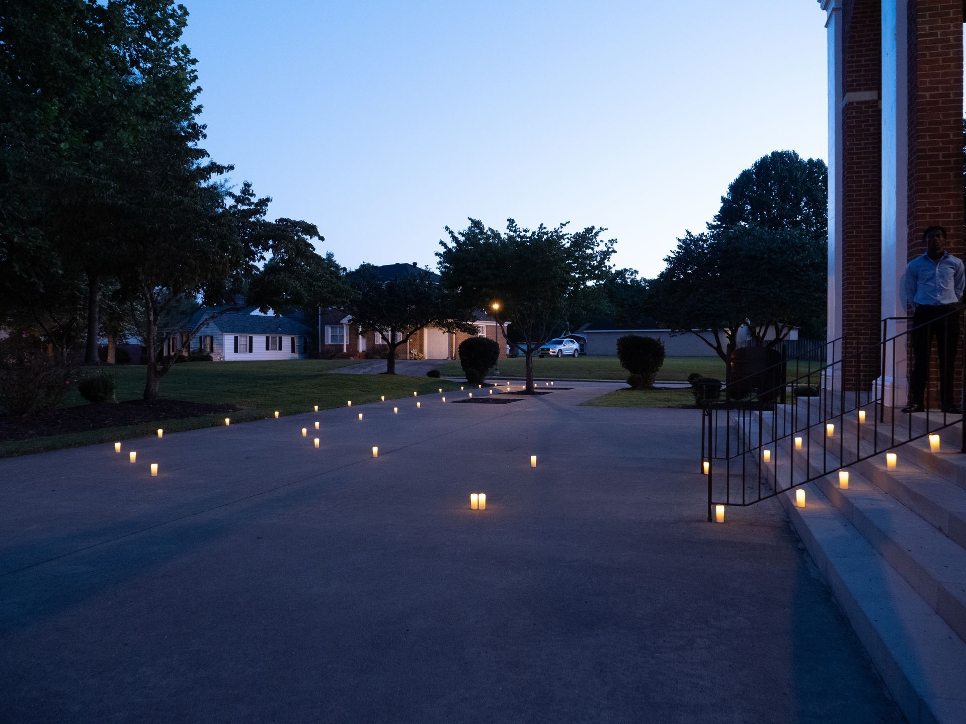 Candlelit pathway in front of Conway Boatman Chapel.