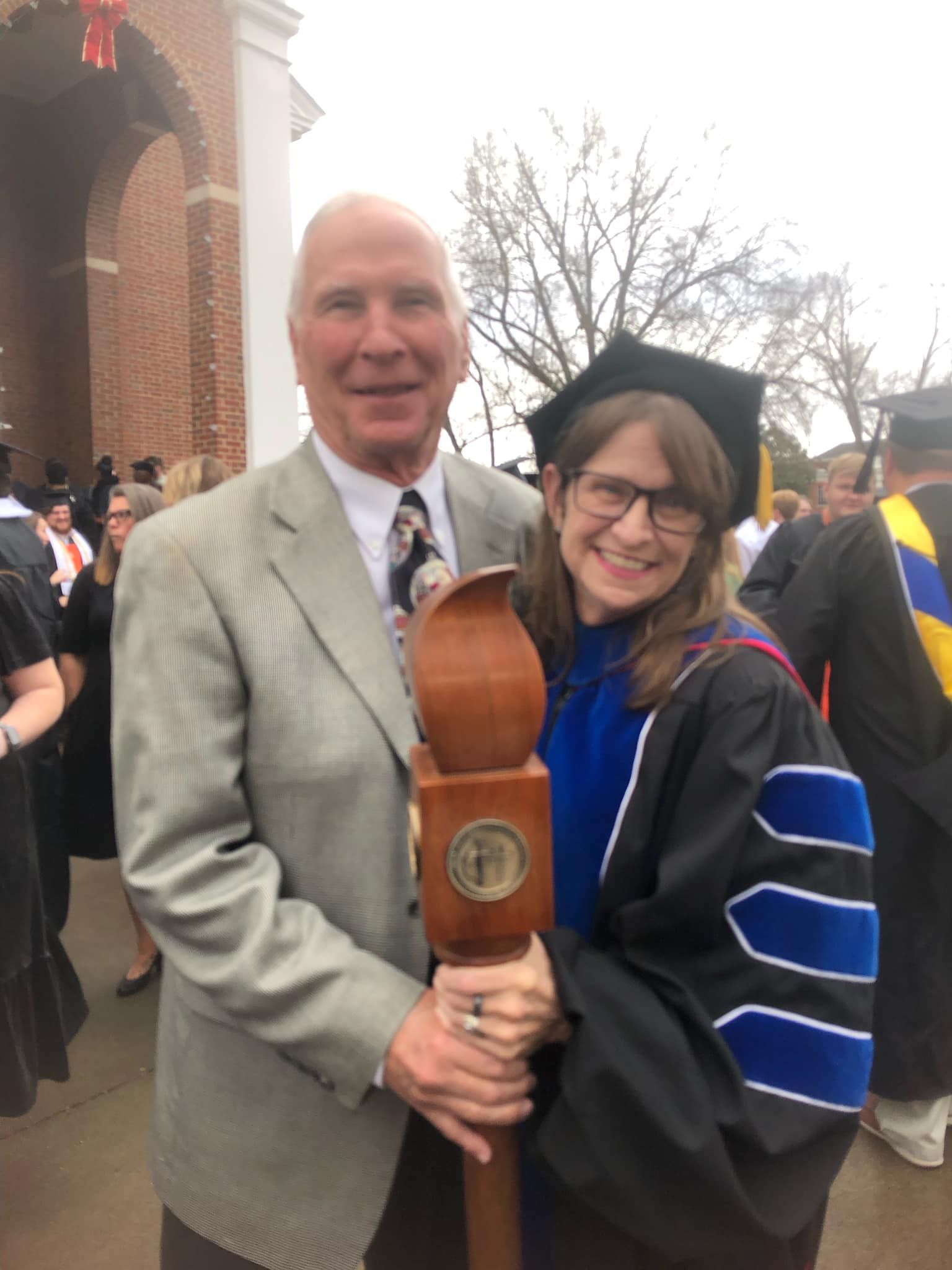 Dr. Larry Inkster and Dr. Christine Marley-Frederick holding AVÍ·µÈ²Õ's ceremonial mace.