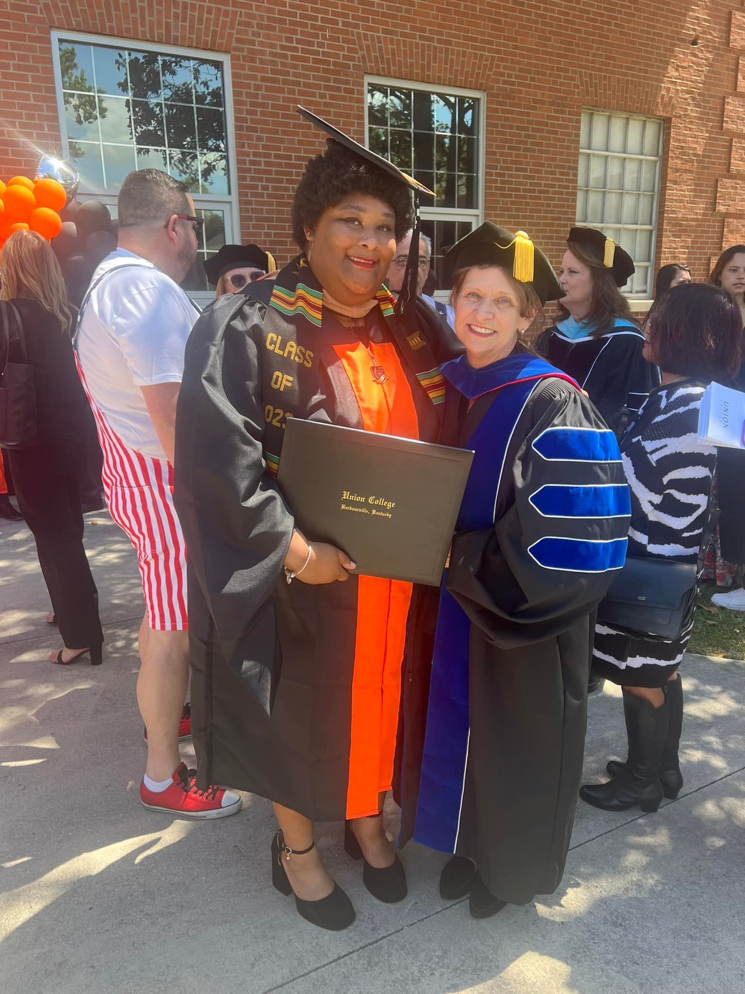 Breonna Williams and Dr. Christine Marley-Frederick at commencement.