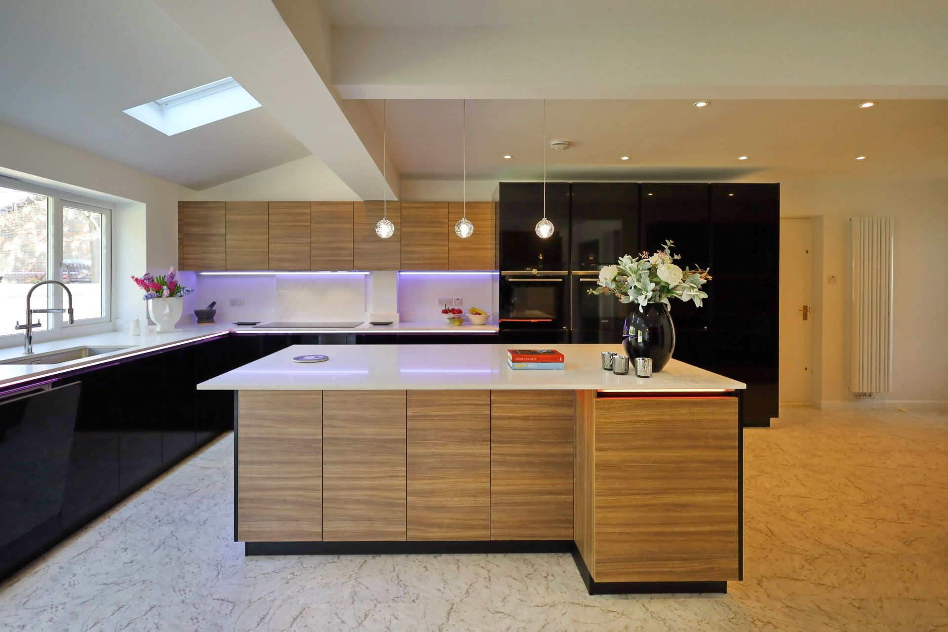 Contemporary handleless kitchen with different zones by exact