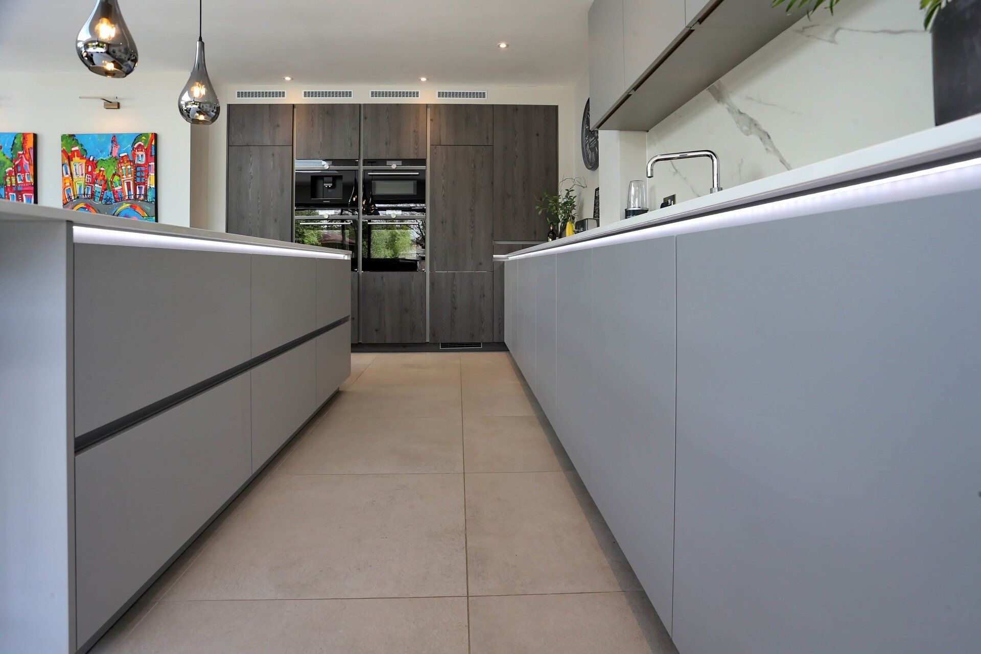 Grey handleless kitchen by exact with a Quooker tap