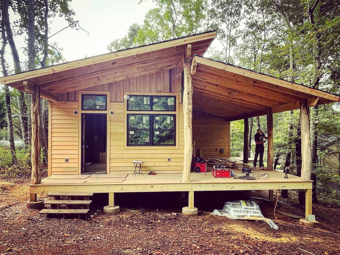 man working on building a tiny home in North Carolina