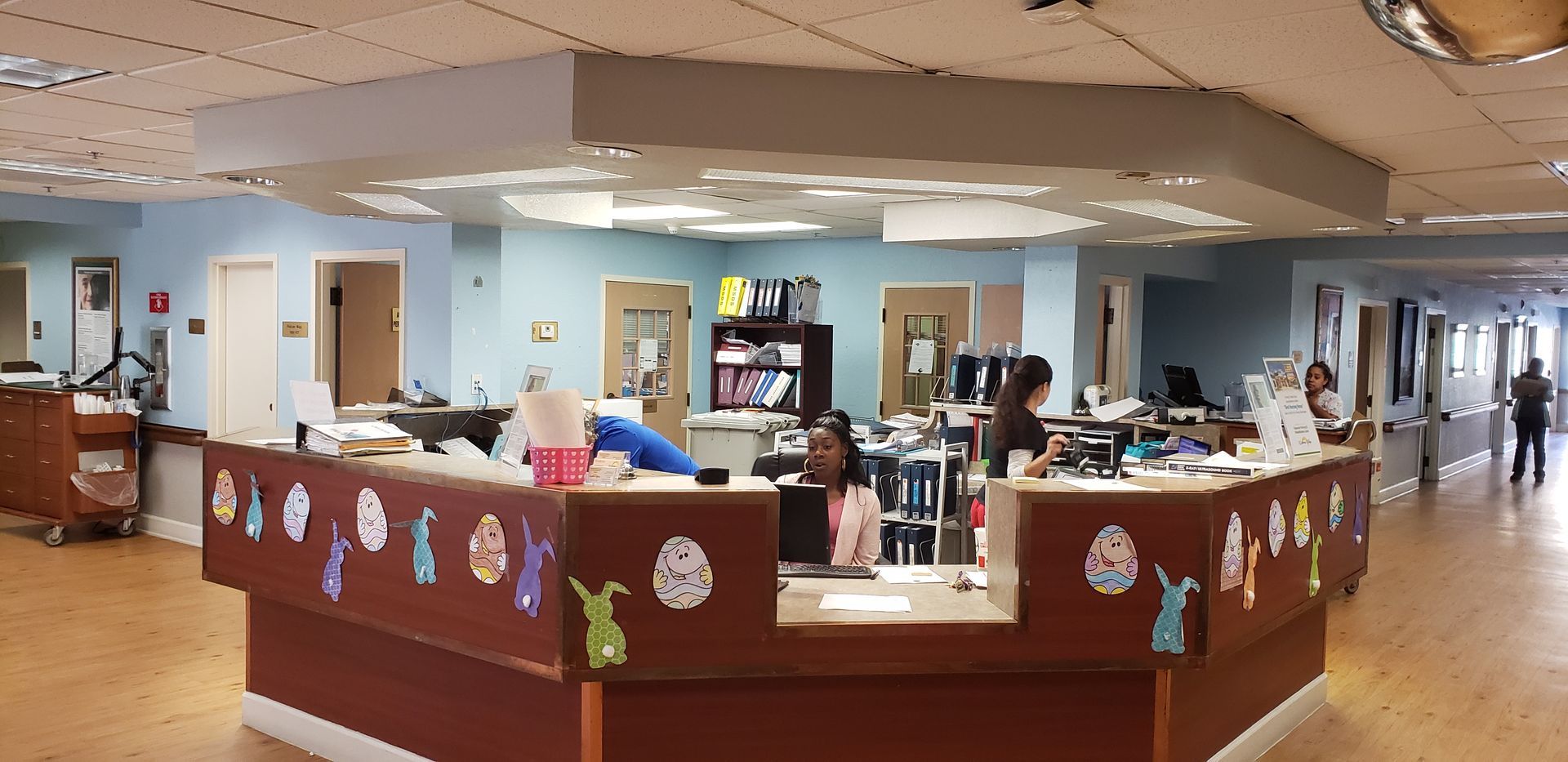 A nurse 's station in a hospital with easter decorations on it