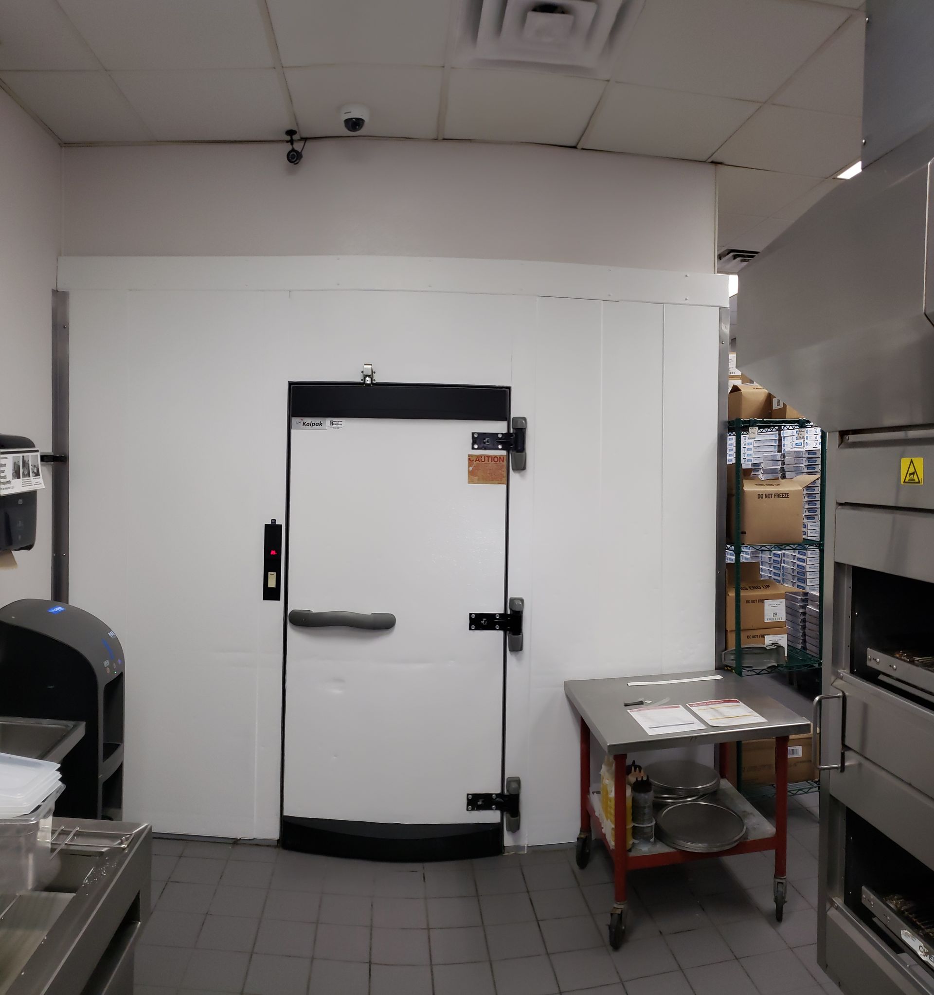 A kitchen with a door that has the number 69 on it