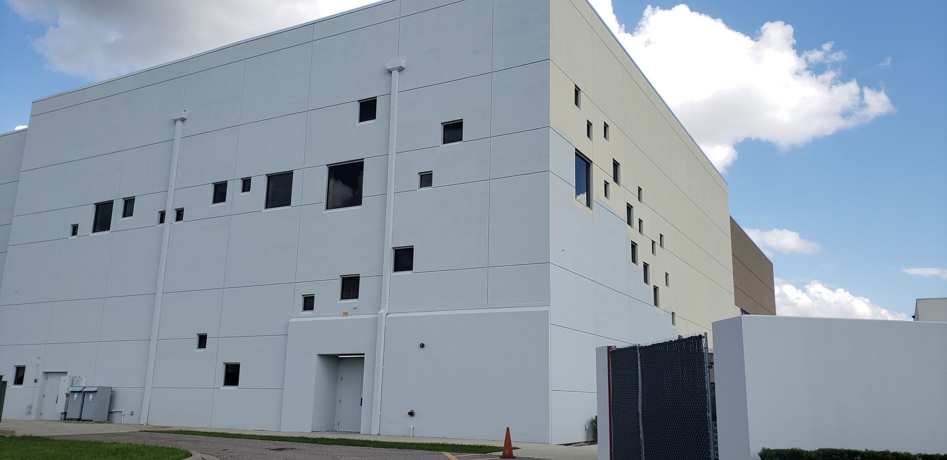 A large white building with a lot of windows