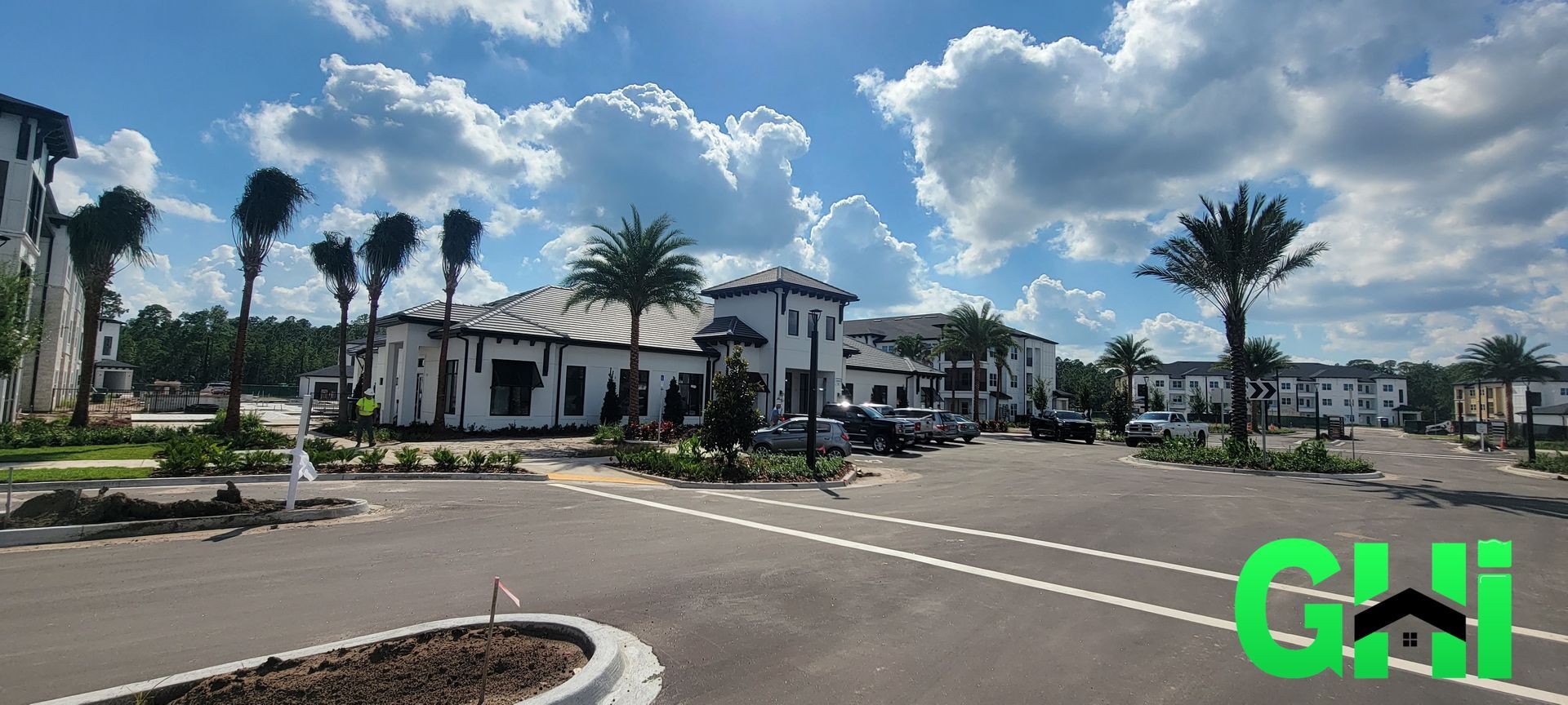 A residential area with a lot of buildings and palm trees