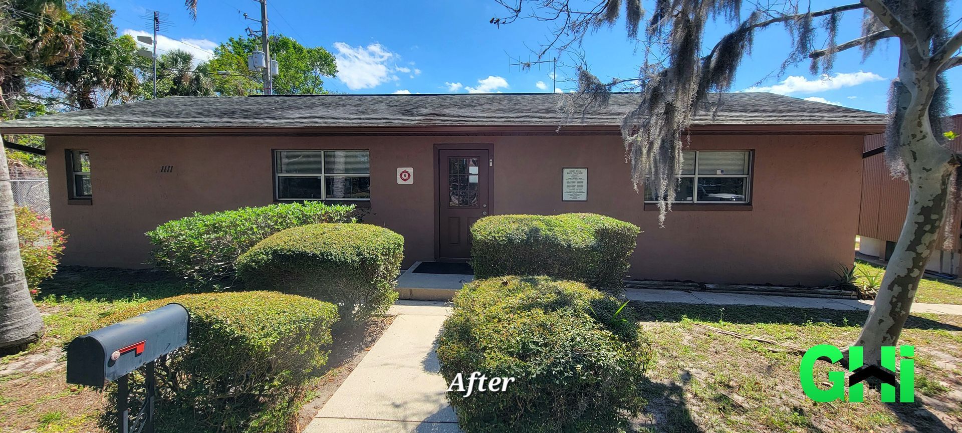 A house with a mailbox in front of it.