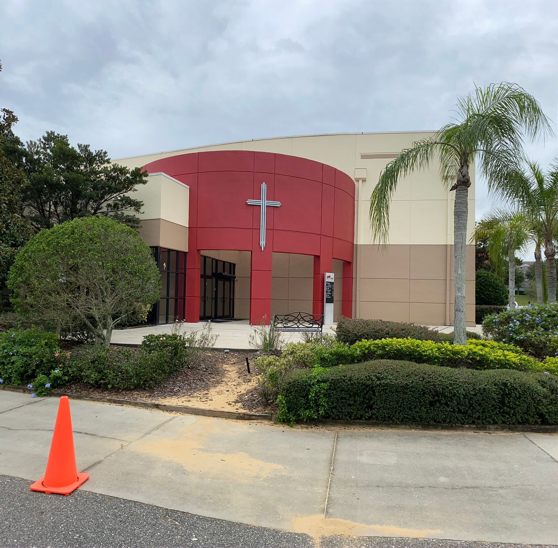A church with a cross on the front of it