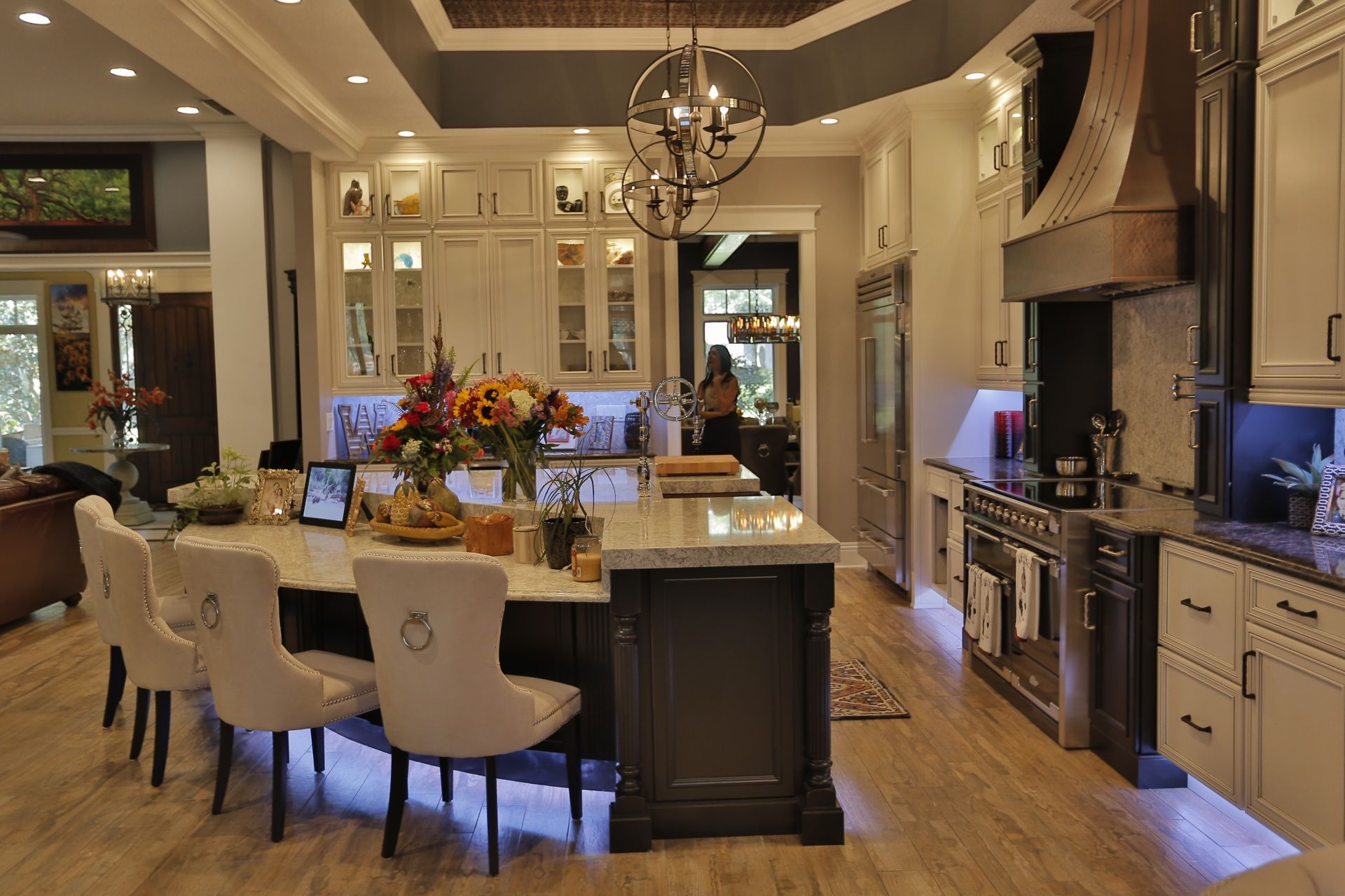 There is a large island in the middle of the kitchen.