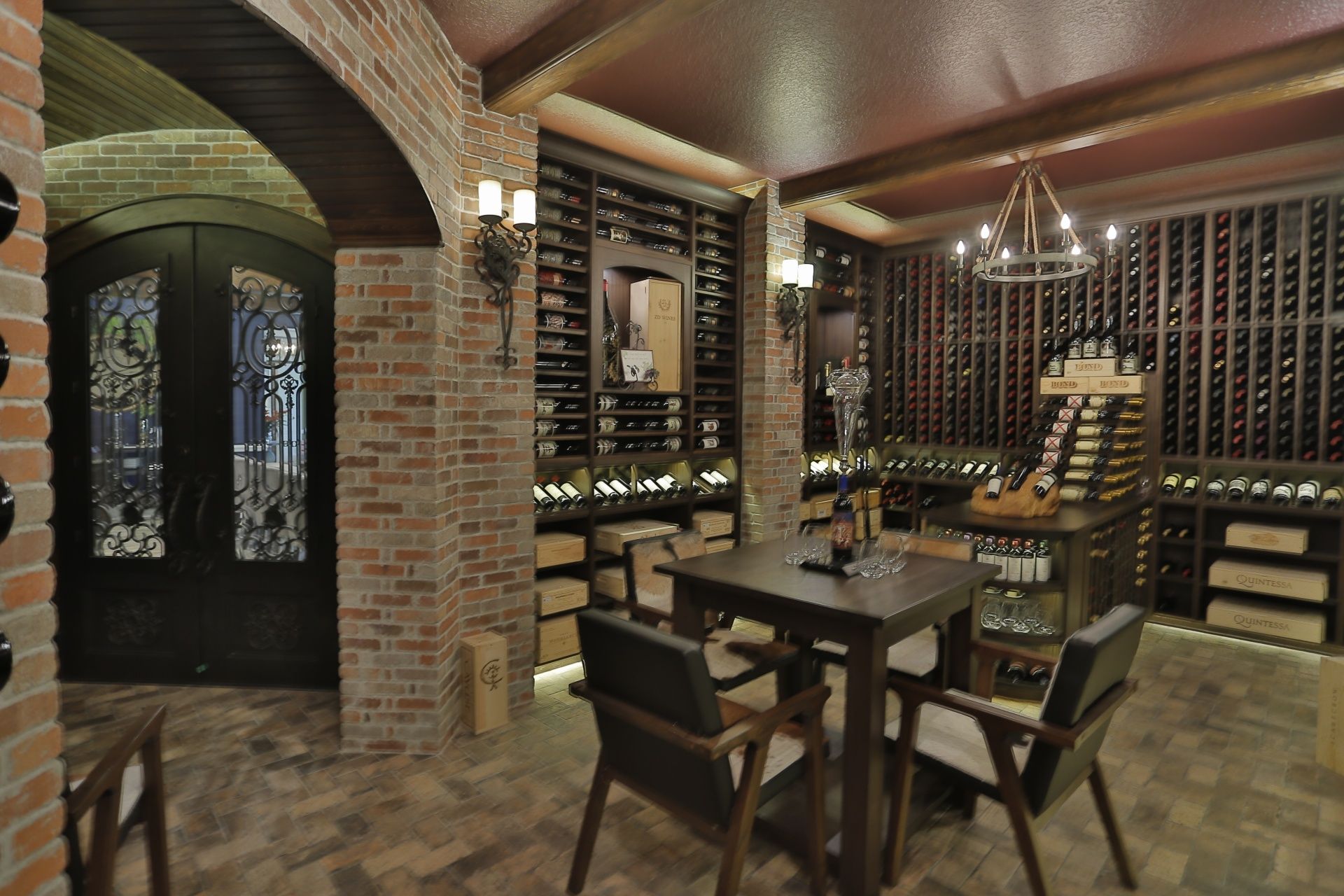 A wine cellar with a table and chairs in it