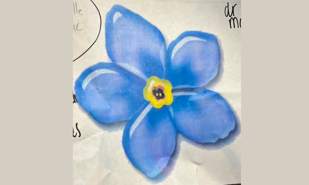 flower design for the tooth tattoo on a dental crown