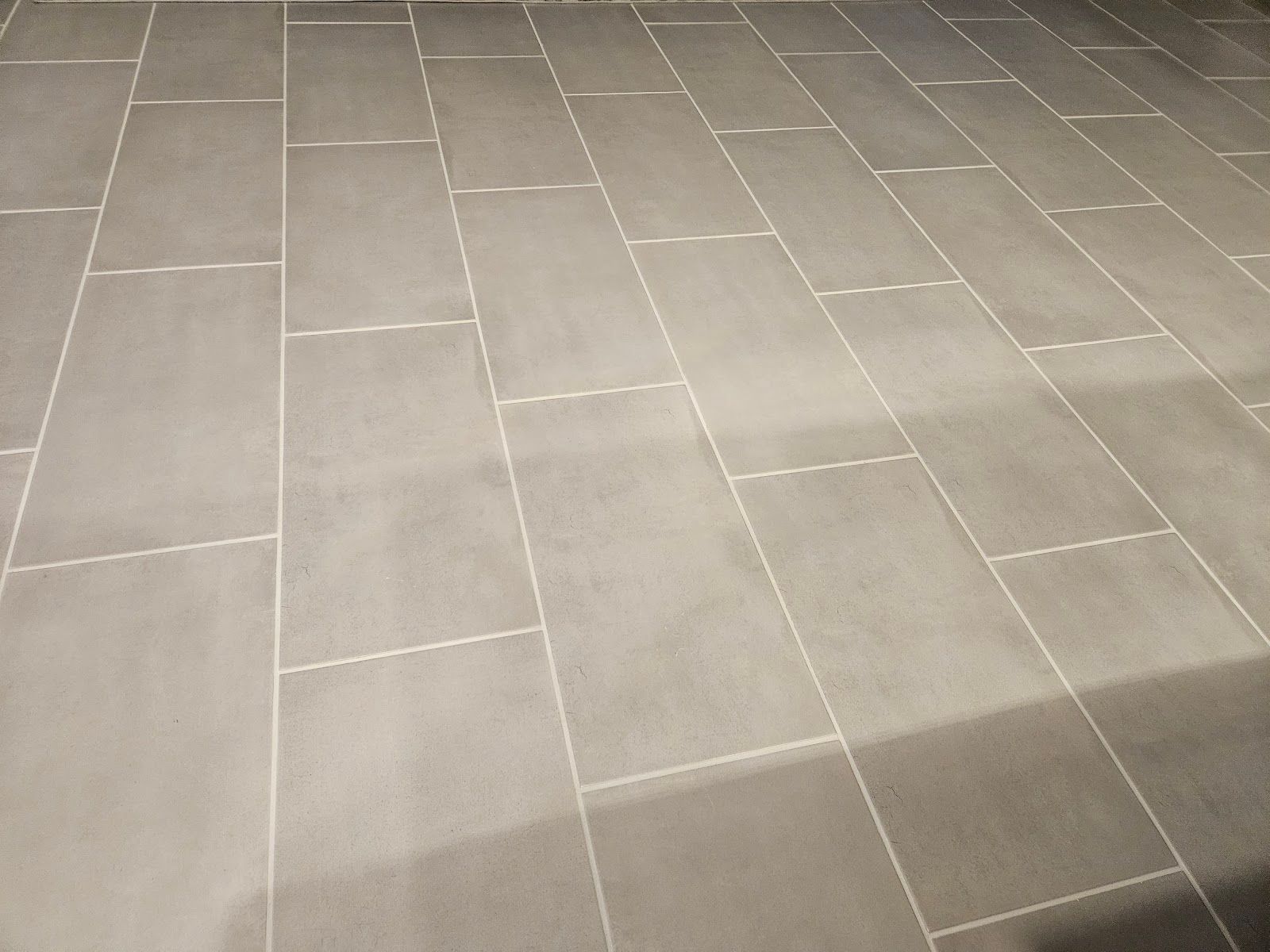 A close up of a tiled floor in a room