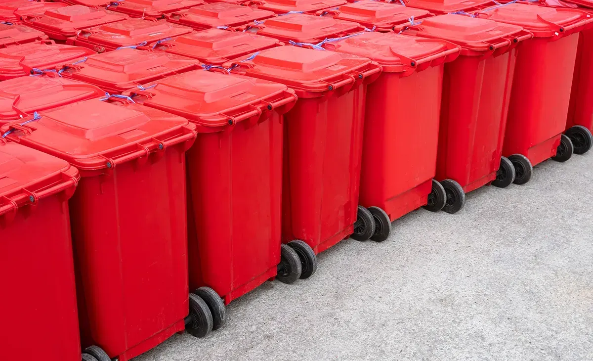 Grouping of red medical waste bins