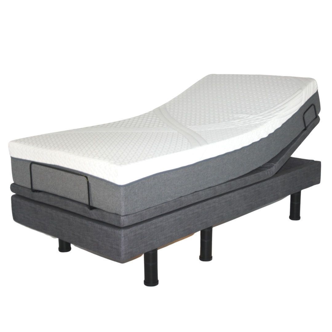 An adjustable bed with a white mattress on it