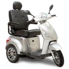 A silver mobility scooter with three wheels.