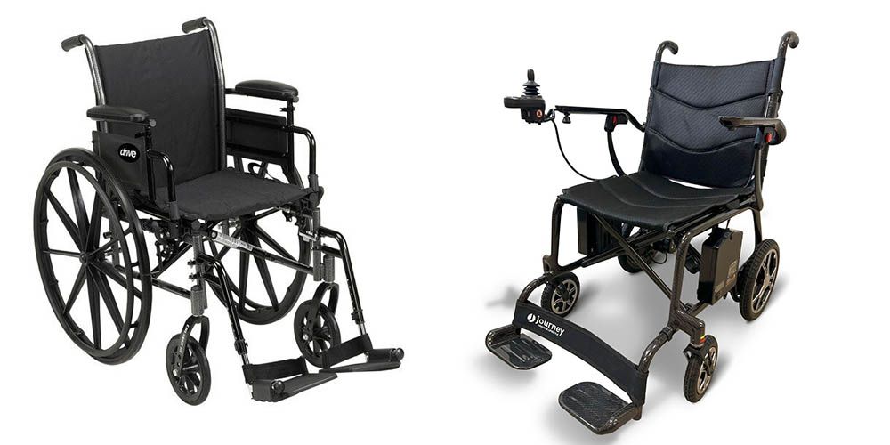 Two black wheelchairs are sitting next to each other on a white background.